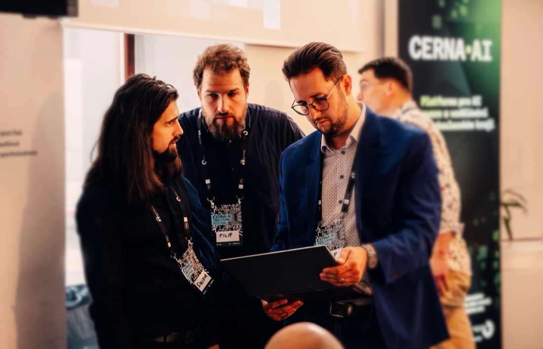 Speakers talking on the ČERNÁ.AI stage