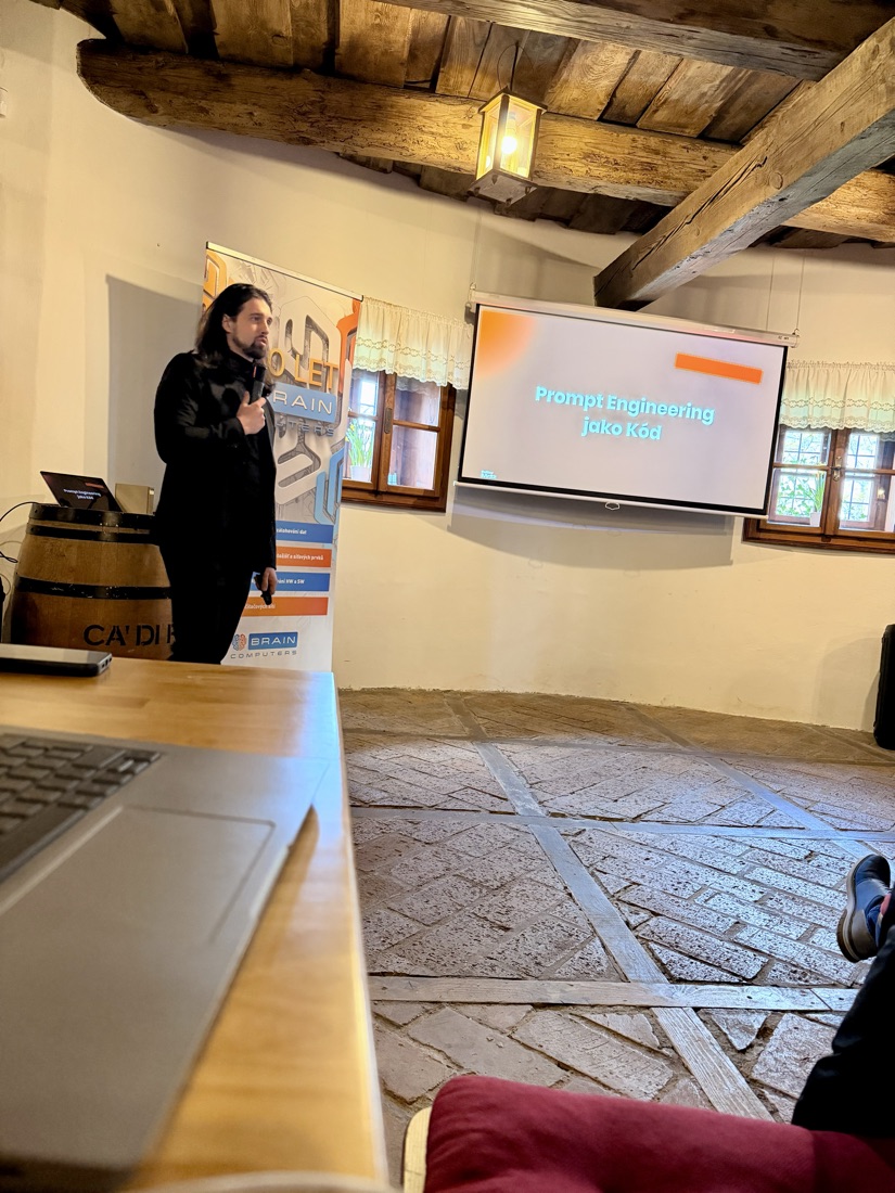 A talk in a historic hall with a wooden ceiling