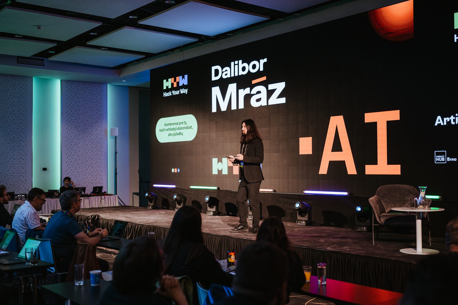 On stage at an AI event